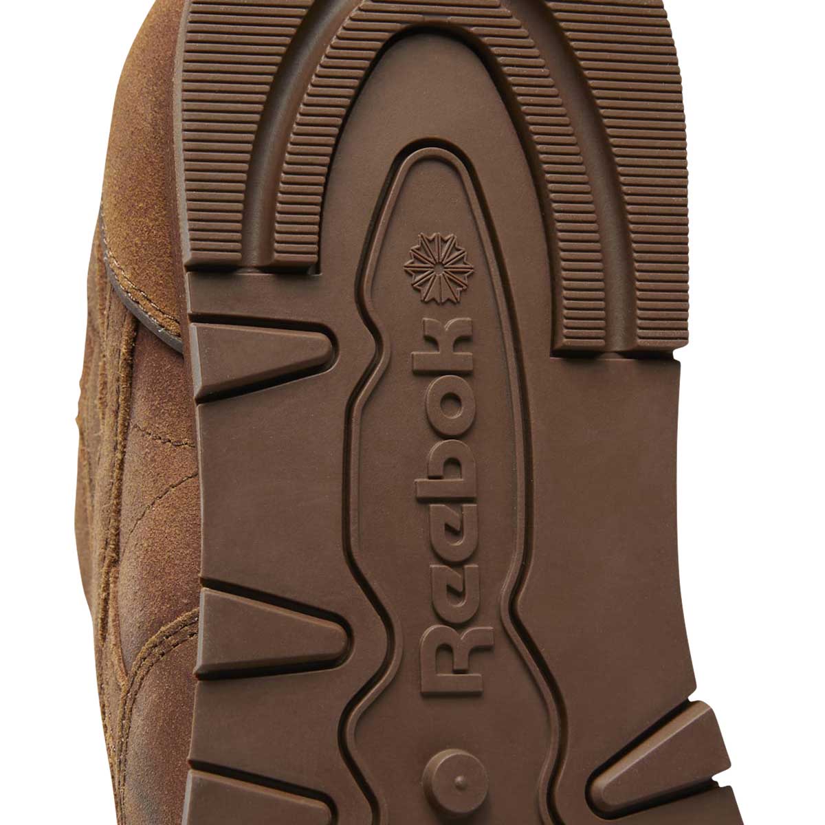 brown leather reebok